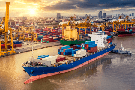 Transportation-Ocean-Cargo-Ship-Docking-at-Port.png