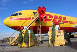 DHL plane with red bow on it