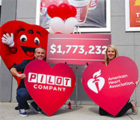 Pilot Co. people posing with hearts