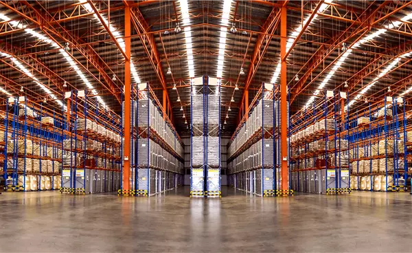 TT Club huge-commercial-warehouse-with-boxes-and-racking_s.webp