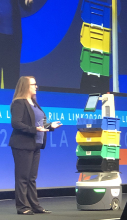 Jessica Dankert and robot present RILA awards