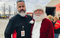 XPO employee with Santa