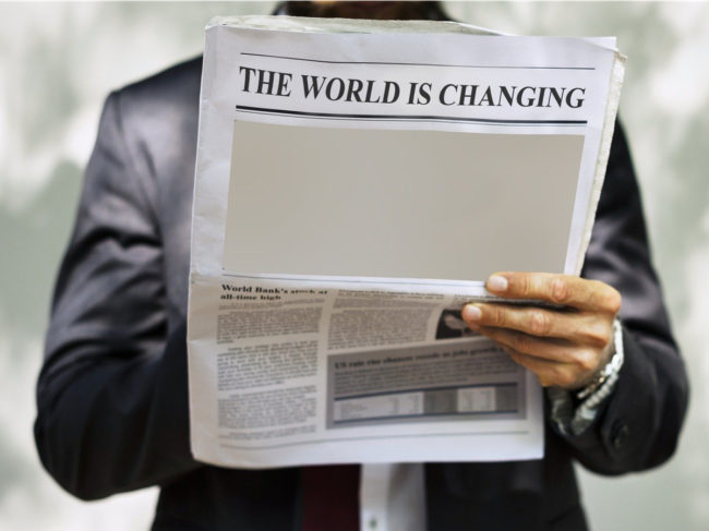 Newspaper headline: The World Is Changing