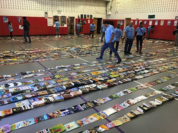 Miles-long line of books in Transervice warehouse