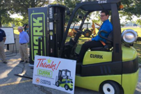 Clark Material Handling and Cardinal Carryor give away a lift truck
