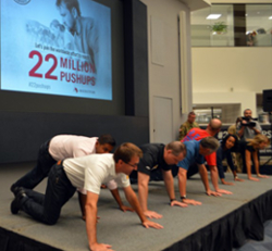 Meritor employees do pushups for military vets