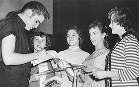 Elvis Presley with fans