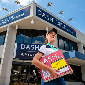Courier in front of Dash building